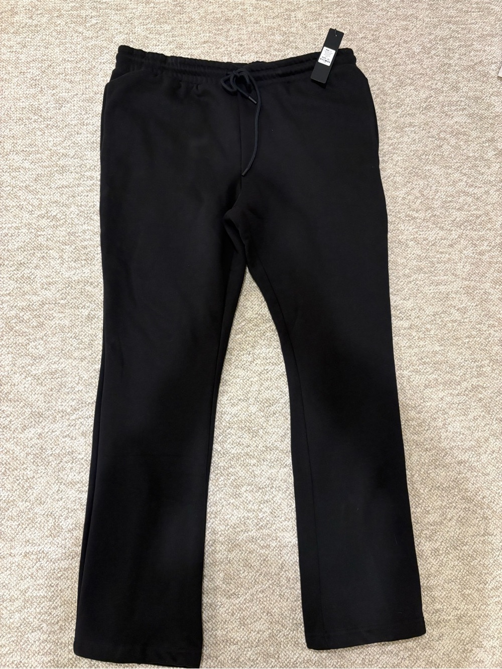 Black Novamen Tyson Back Zipper Skinny Flared Sweatpants.